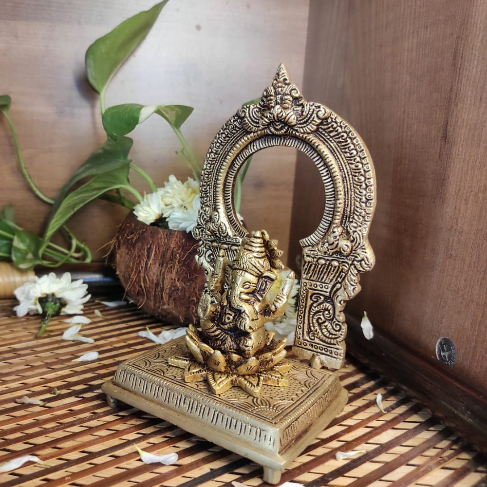 PujaCraft Brass Ganesha Idol with Prabhavali Stand Arch ( Width: 10cm, Height: 17cm, Weight: 910 Grams )