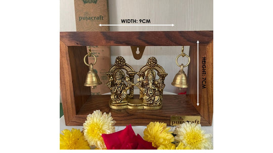 PujaCraft Brass Ganesha And Lakshmi Idol With Wooden Frame ( Width: 9cm, Height: 7cm, Weight: 405 Grams )