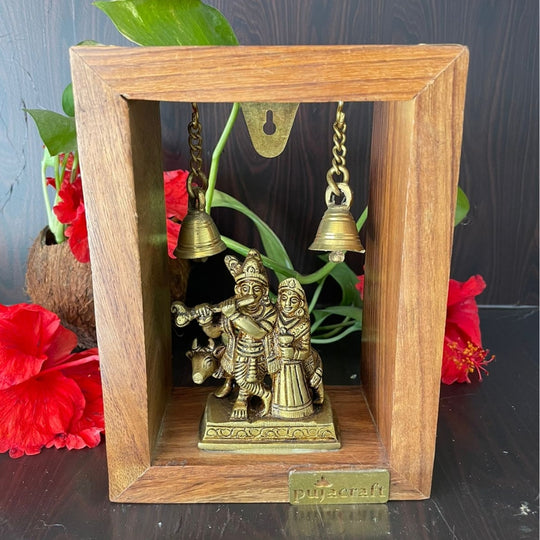 PujaCraft Brass RadhaKrishnan Idol with Wooden Frame ( Width: 3cm, Height: 8cm. Weight: 320 Grams )