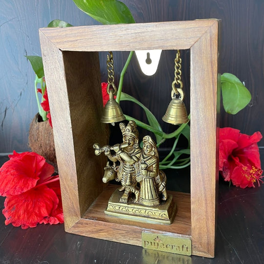 PujaCraft Brass RadhaKrishnan Idol with Wooden Frame ( Width: 3cm, Height: 8cm. Weight: 320 Grams )