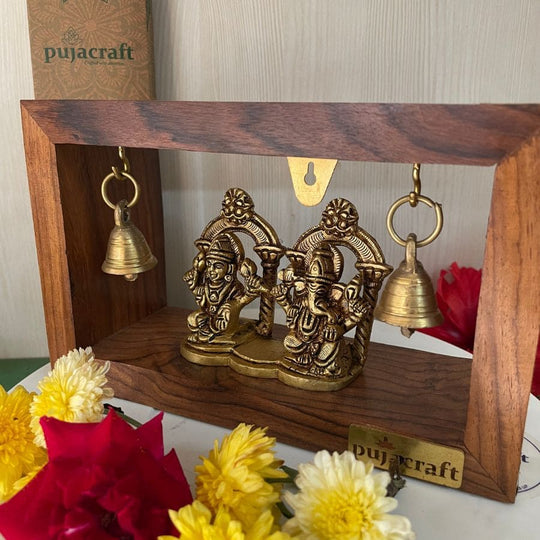 PujaCraft Brass Ganesha And Lakshmi Idol With Wooden Frame ( Width: 9cm, Height: 7cm, Weight: 405 Grams )